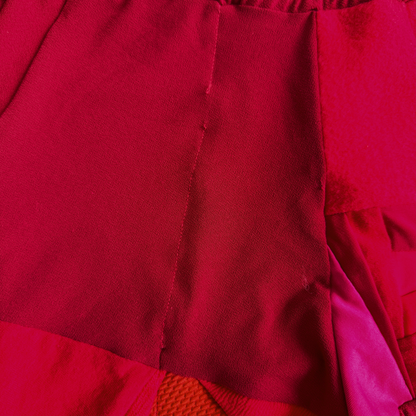 size medium  - preloved - red "all-over re-roll" jogger