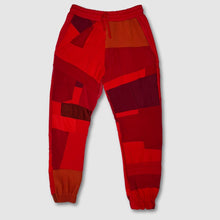 Load image into Gallery viewer, preloved - SIZE: XS - red &#39;all-over reroll&#39; joggers
