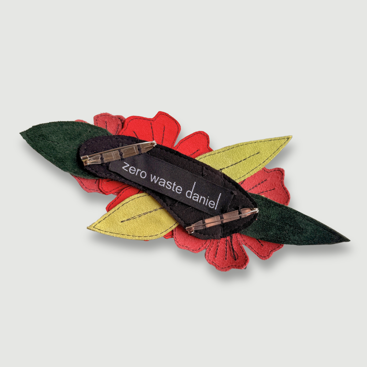 the leather poppies brooch