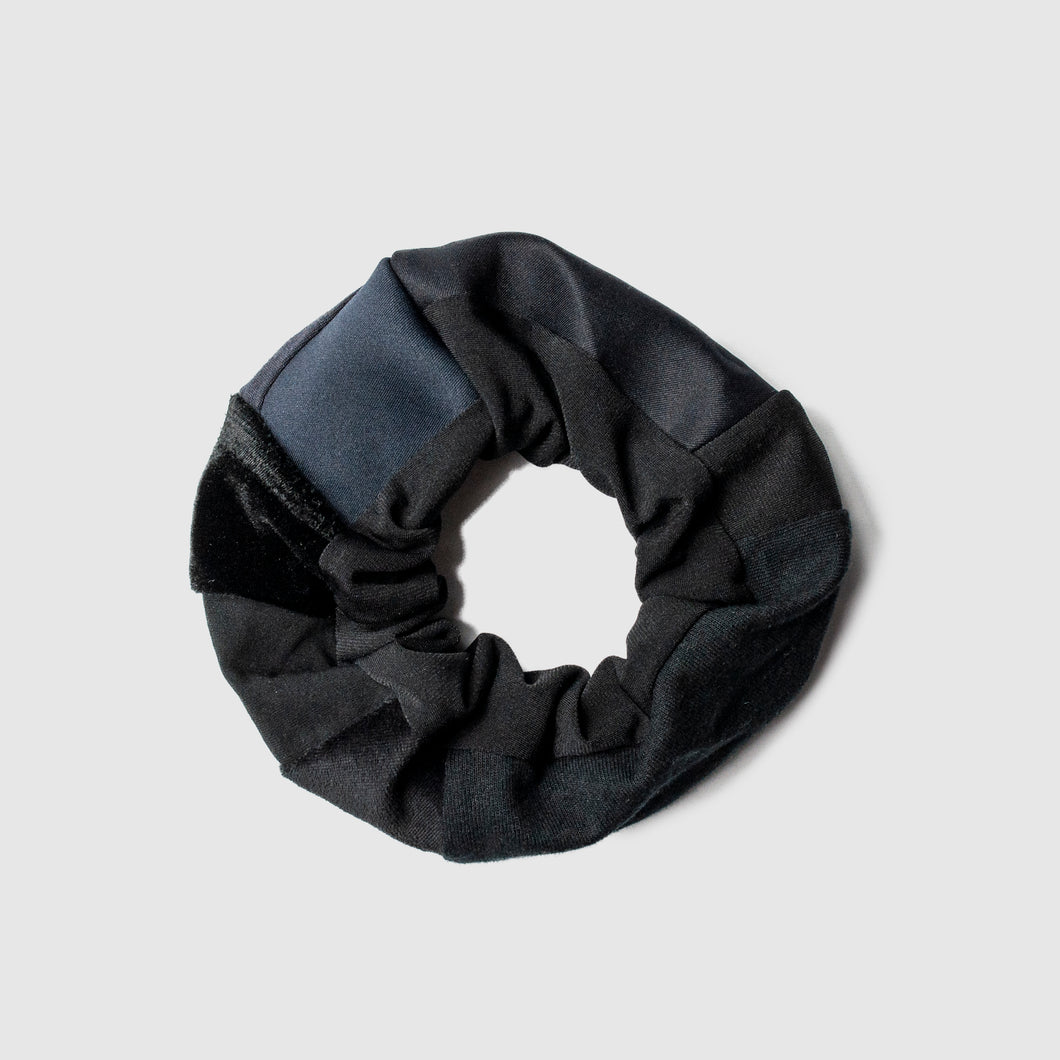 black 'all-over reroll' scrunchie