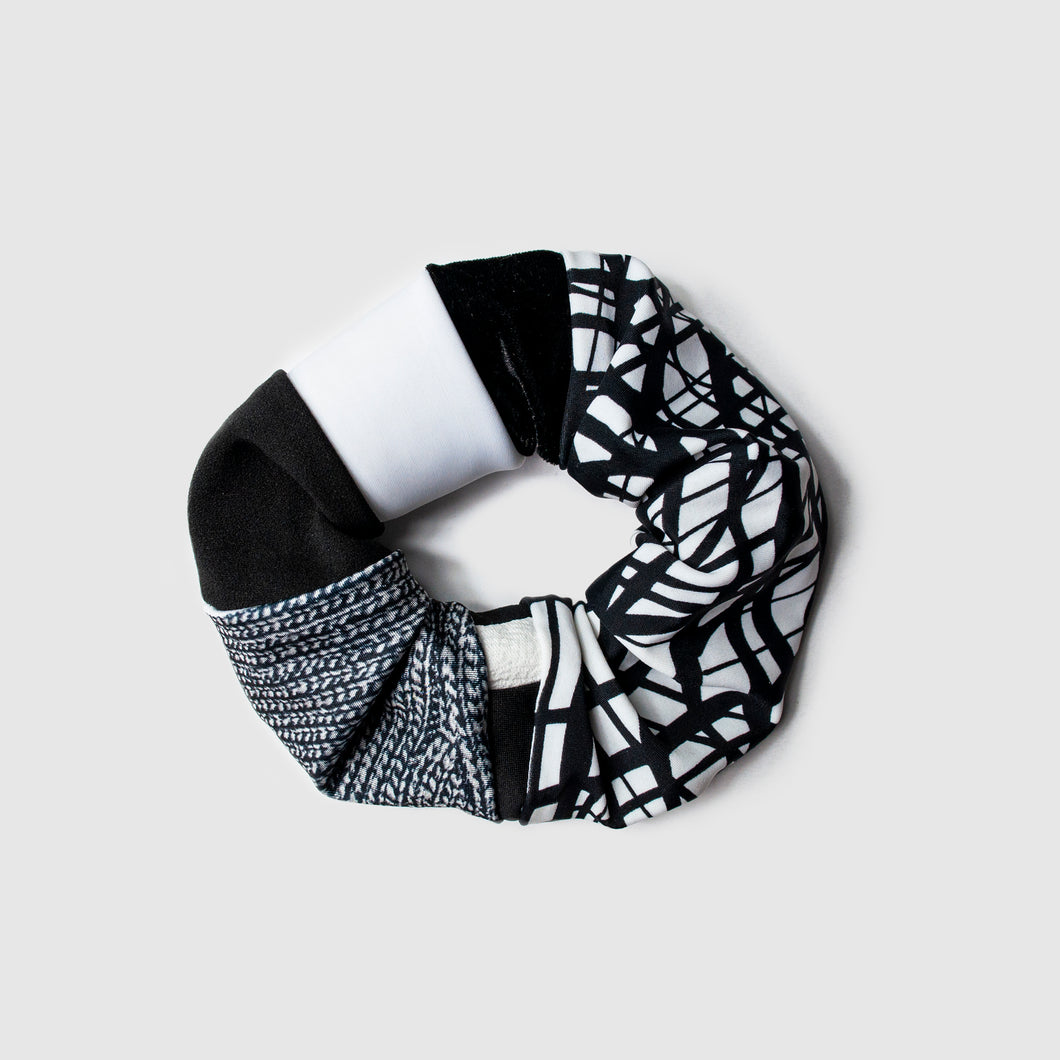 black + white 'all-over reroll' scrunchie